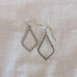 Kendra Scott small silver signature earrings.